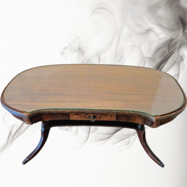 Sophistication Redefined Graceful Silhouette: Distinctive kidney-shaped form curves beautifully into any space. Exquisite...