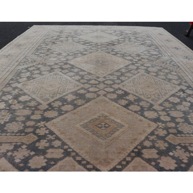 Measures: 6'4 x 9'4 Antique Turkish Sivas Rug with Diamond Medallions and Allover Floral Field. Keivan Woven Arts /...