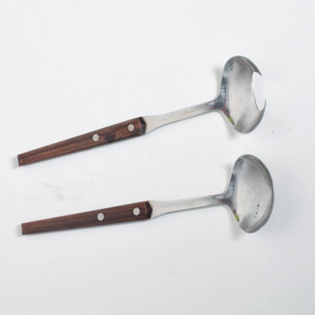 For your consideration, we are pleased to offer you: a mid-century set of salad servers in the style of Dansk designs...