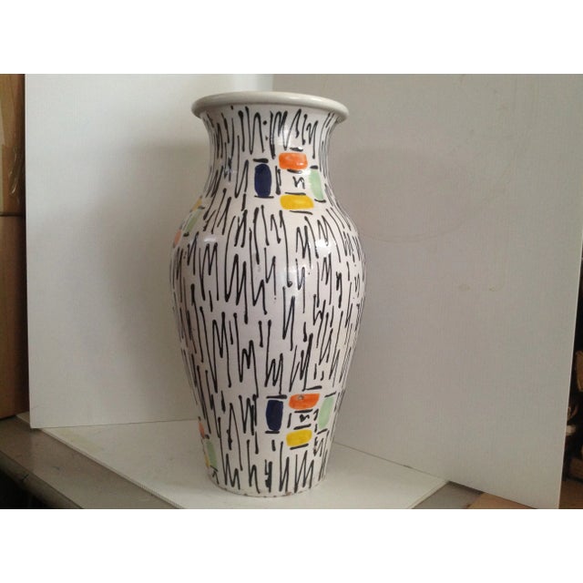 Polychrome ceramic umbrella stand, made in Italy.