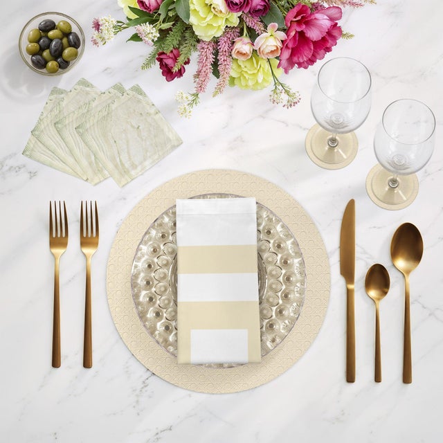 Embracing a minimalist aesthetic through its solid color pattern, this Solid Round Cane Placemat celebrates the beauty of...
