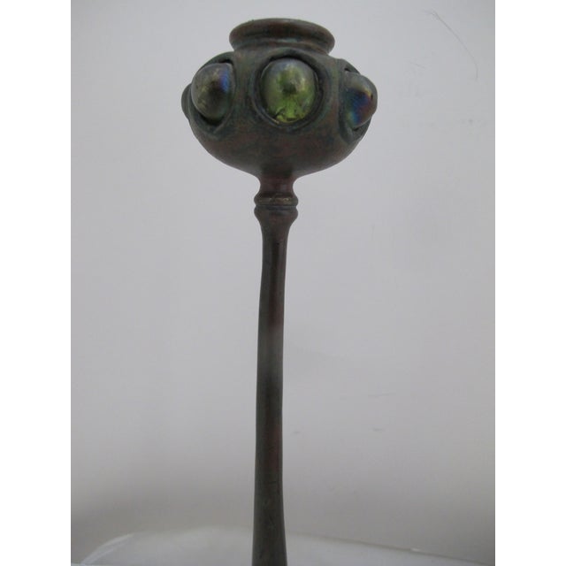 Unique pair of Tiffany Studios, early 20th century bronze candlesticks, with with Favrile glass accents. A quirky design...