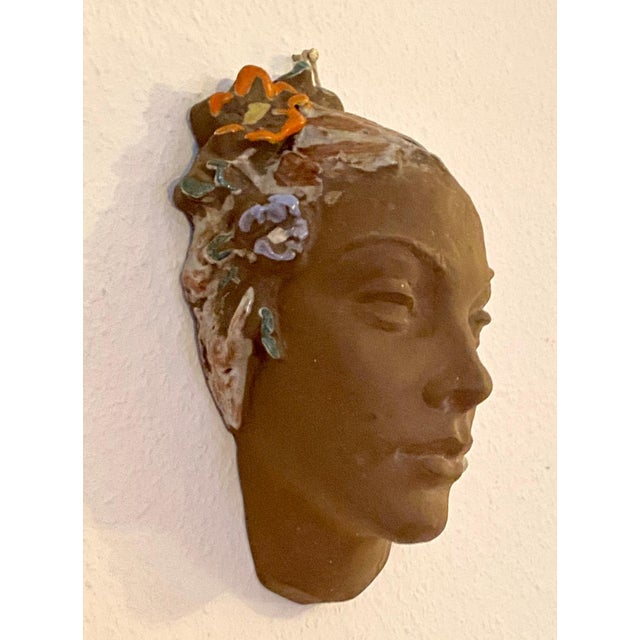 Mid-Century Wall Mask of Woman with Flower Wreath by Lore Friedrich-Gronau for Karlsruhe Majolika, 1958, in Very Good...
