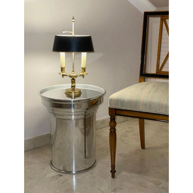 Rl 06 round side table in mirror-polished aluminum by caspal dimensions: ø 38 x h 45 cm. Materials: mirror-polished...