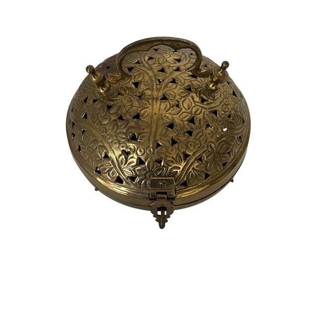 Vintage round pierced cricket box. Great for catchall or as a sachet in drawers. Measures 6.5” diameter x 6” h with handle...