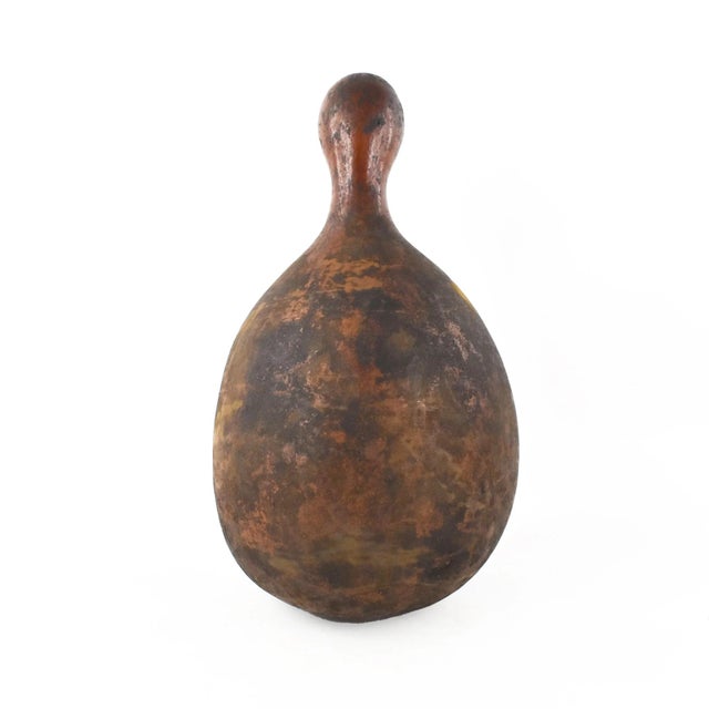 The Maasai milk gourd, a significant symbol in Maasai culture, epitomizes sustenance, community, and heritage within this...