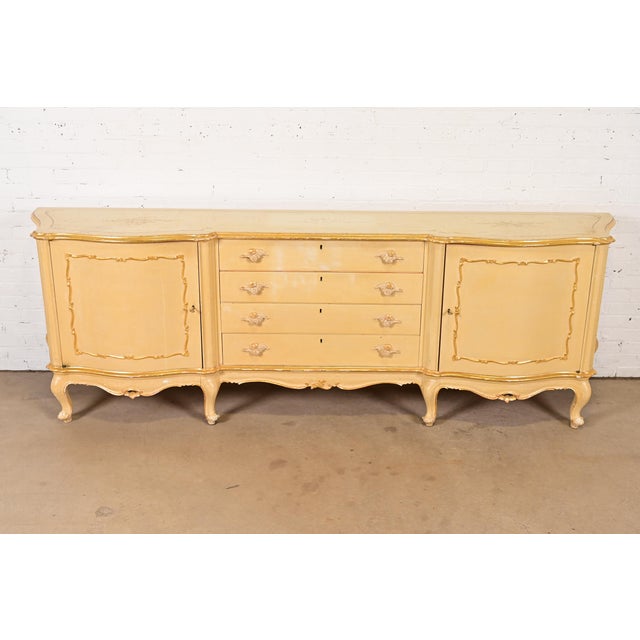 A gorgeous antique Italian Louis XV style monumental sideboard, bar cabinet, or credenza Italy, Circa 1940s Carved walnut,...