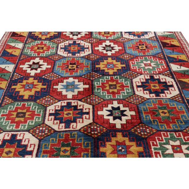 Made with hand-knotted wool in Turkey circa 1950-1950, this 7x8 vintage tribal rug is an exciting new curation from Rug &...