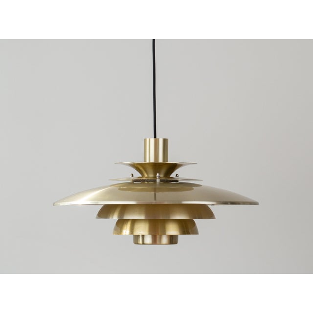 A beautiful vintage pendant lamp designed by danish designer kurt wiborg and manufactured by jeka. With its timeless form...