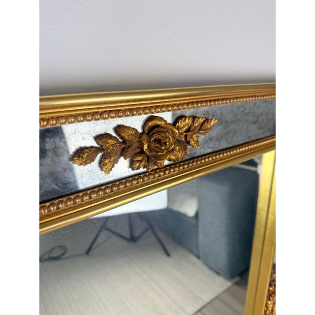 Large Vintage French Gilded Mirror by AJA Paris, 1950s, in Flawless conditions. Designed 1950 to 1959 This piece has an...