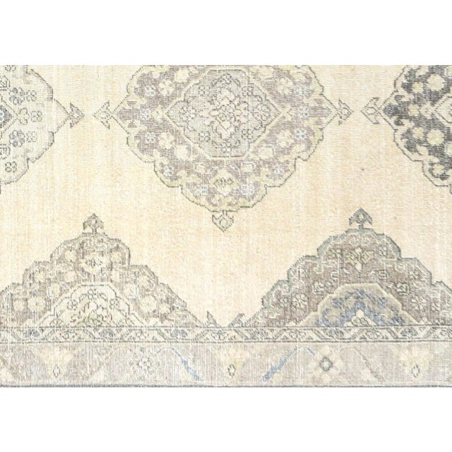 1960s Turkish Oushak Rug. Hand woven with wool on wool foundation in the Oushak region of Western Turkey. The Anatolian...