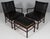Ole Wanscher pair of lounge chairs and ottoman and new upholstered with black pure full grain aniline leather. Made in...