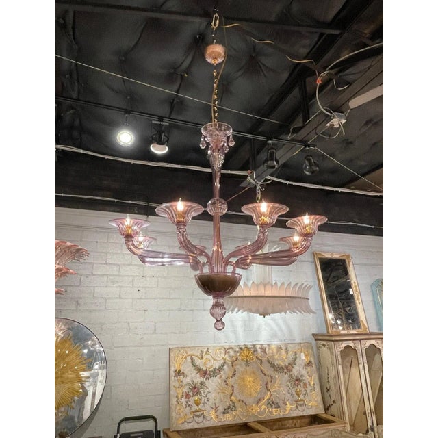Gorgeous modern Murano amethyst glass 8-light chandelier. Circa 2000. The chandelier has been professionally re-wired,...
