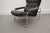 Lounge chair made by Scapa Rydaholm Sweden - Has grey fabric seating on a chromed wheeled frame - Produced in the 1970s I...