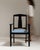 This 1920s Arts and Crafts upholstered armchair from France is made in ebonized wood with a blue upholstered seat and open...