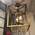 Visual Comfort's Osborne Lantern in Gilded Iron in glowing gold. Height: 22" x Width: 18" Canopy: 5.5" Square Socket: 3 -...
