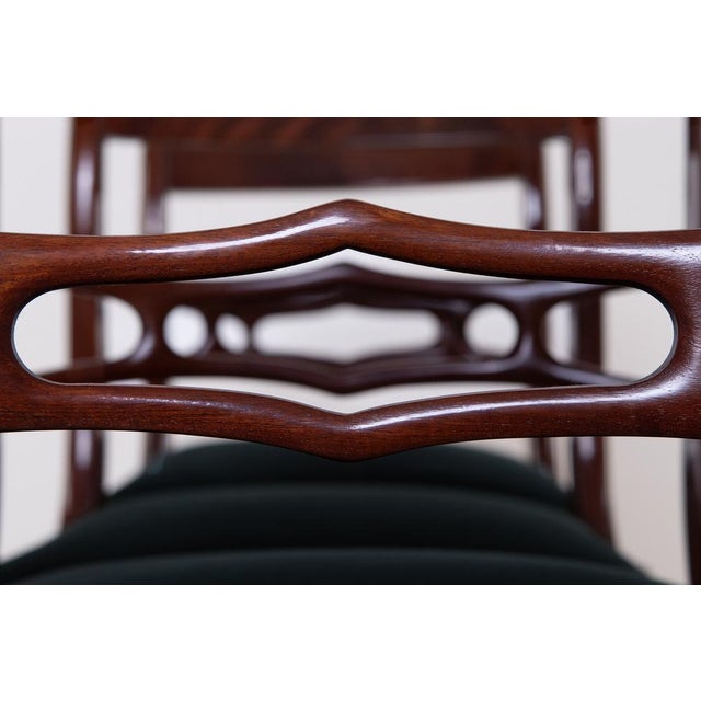 A very nice table set consisting of a table and four chairs. All chairs are upholstered by hand in a traditional style...