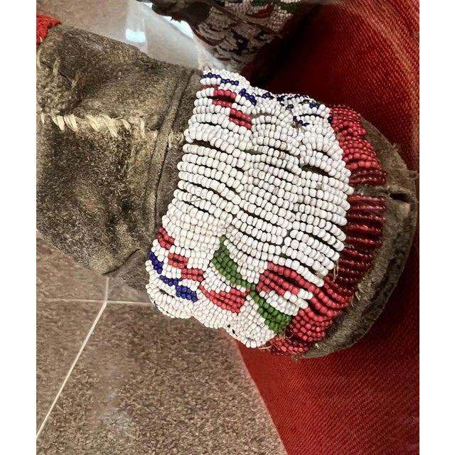 White Antique Custom Framed Cheyenne Beaded Sinew Sewn Moccasins in the Style of Native American Arts and Crafts For Sale - Image 8 of 13