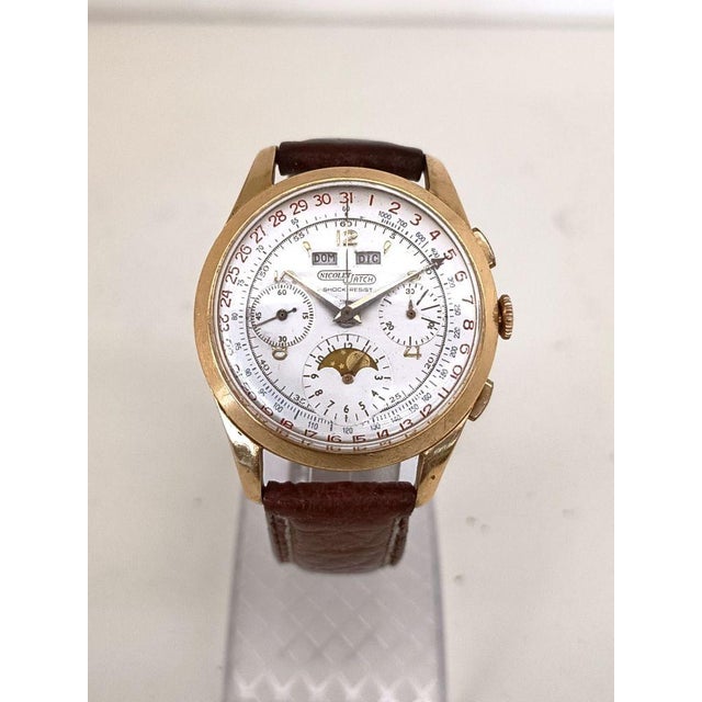 Brand Nicolet Model Moon phase chronograph Year 1950-59 Movement Manual winding Movement type Valjoux 88 Case 18K gold...