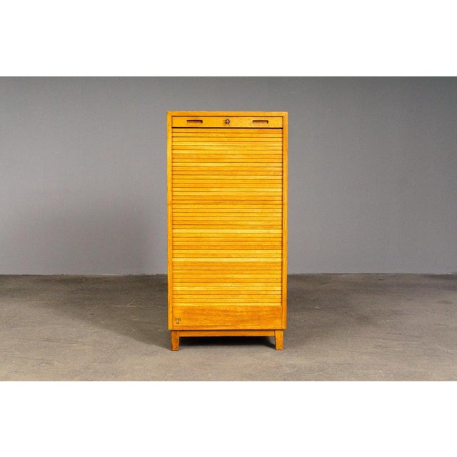 Item: Roll-top cabinet Period & Style: Mid-Century - mid-20th century Features - timeless and practical piece of furniture...