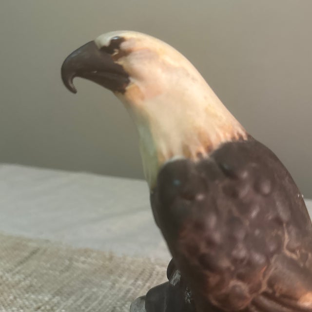 Impressive large glazed ceramic eagle figure featuring bold, expressive detailing and a commanding presence. The piece...