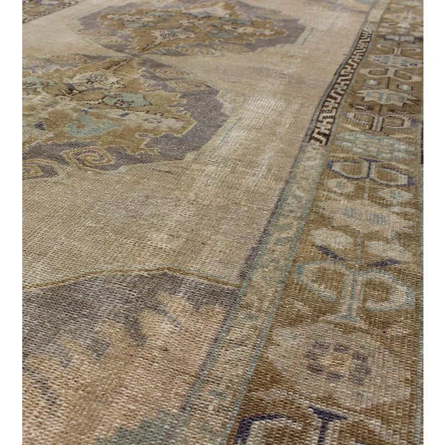 Mid 20th Century Mid 20th Century Vintage Gallery Turkish Oushak Rug With Floral Medallions in Earthy Tones and Lavender For Sale - Image 5 of 7