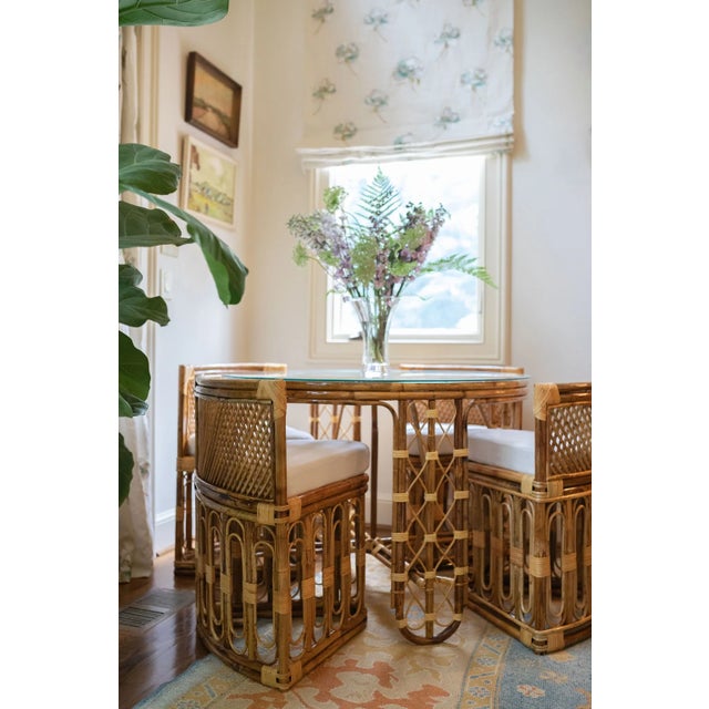 The Penelope Table truly showcases the design and artisanal talents of the weavers that produce it. It comes with the four...