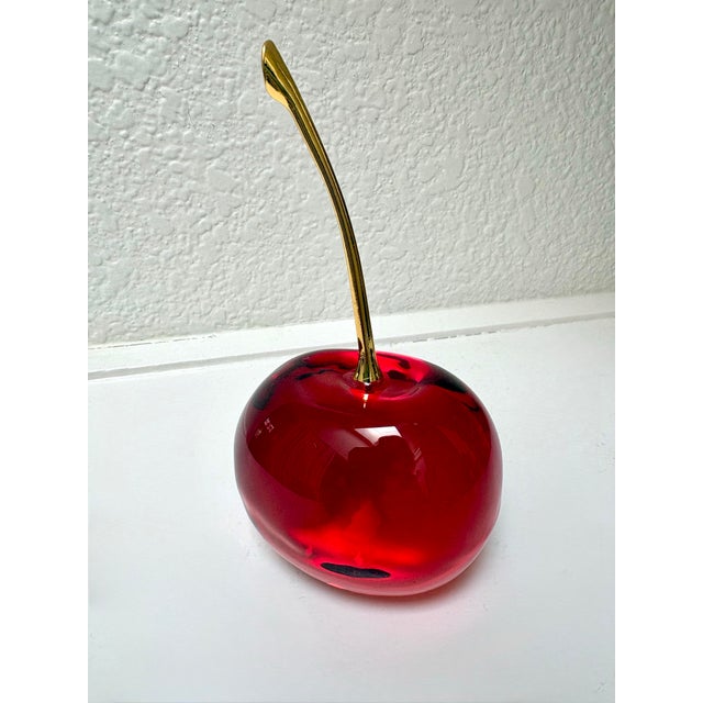 Large whimsical glass cherry with brass stem home accent. Vintage Anthropologie. Fun decor accent for a bar cart, kitchen...