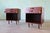 A pair of nightstands designed by Harvey Probber c. 1950s. Rich mahogany cases with two thin draers and open cubby below...