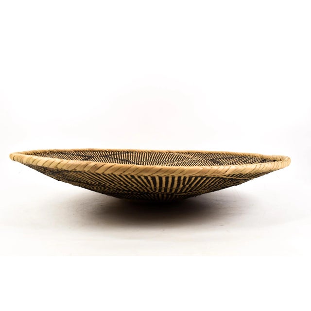 Tonga Binga baskets are traditional handcrafted baskets made by the Tonga women of Binga district in Zimbabwe. Crafted...