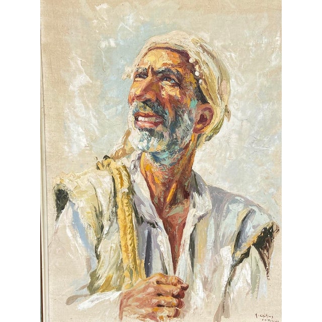 An original signed 1954 oil portrait by A. Shitzas, created in Tehran and presented in its original aged green wooden...