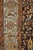 An early 20th-century beautiful brown Persian Bakhtiari Oversized rug with a small snake found