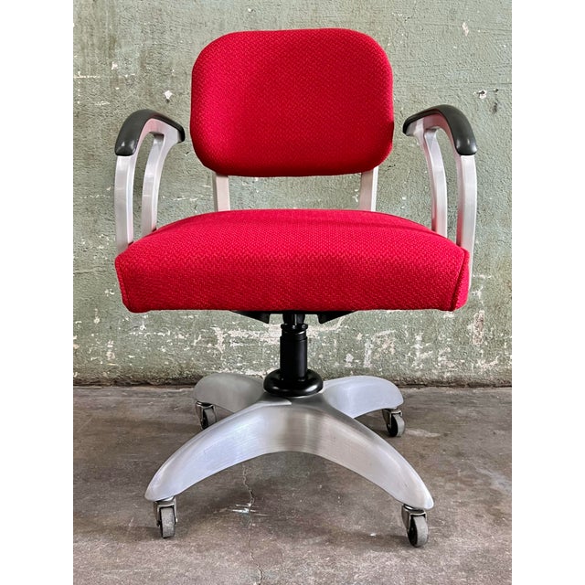 A rare early example of a General Fireproofing Goodform model 3257 Comfort Master Jr. adjustable aluminum swivel chair,...