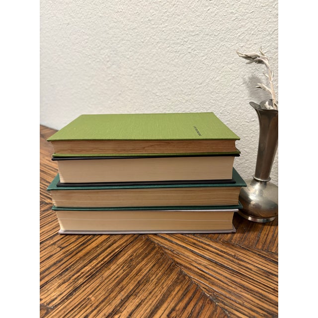 Introduce a commanding presence of historical depth to your library display with this curated 4-book stack of vintage...