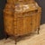 Venetian trumeau from the mid-20th century. Double body furniture carved and veneered in walnut, olive, burl and beech...