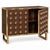 Warm chocolate brown surrounds a grid of clear Murano glass spheres in this Italian drinks cabinet. Forty spheres animate...