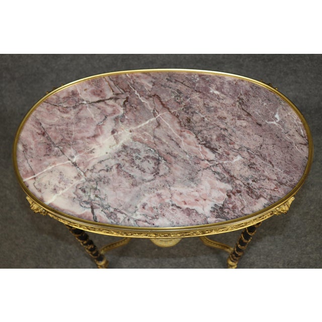 This exceptionally elegant German Louis XVI-style bronze and marble table, made by August Förster in the late nineteenth...