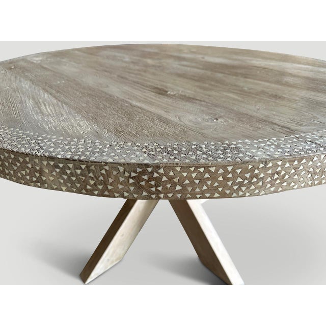 Impressive reclaimed teak wood dining table or entrance table. We added hand cut shell inlay on the top section and the...
