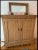 A lovely antique pine cupboard cabinet with two door, two shelves and scalloped apron. Product Information: Materials:...