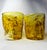 A wonderfully expressive pair of vintage Venetian Murano art glass drinking tumblers, featuring luminous golden-yellow and...