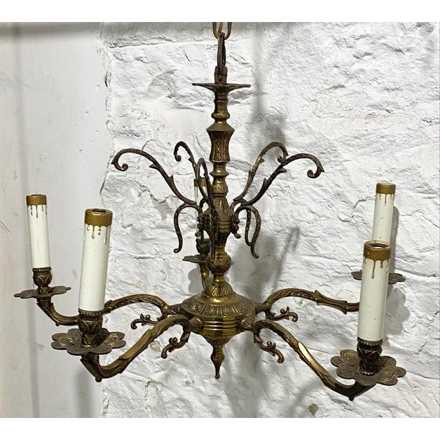 9” chain 16” across 14”tall 14” wire Bring dramatic old-world charm to your interior with this stunning 5-light...
