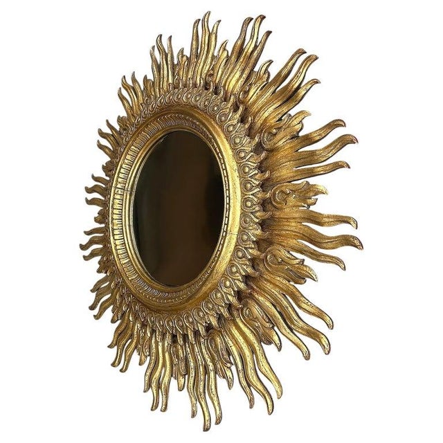 Monumental Francisco Hurtado, Carved Sunburst Wall Mirror Offered for sale is a very large Mid-century Hollywood Regency...