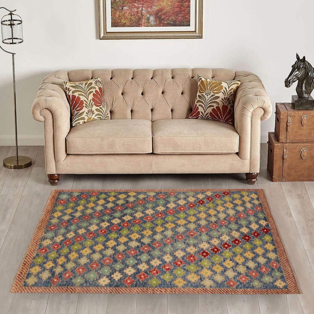 This stunning hand-knotted Afghan Balouchi rug is a captivating addition to any decor. Crafted by skilled artisans, it...