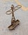 Add vintage architectural elegance to your entryway with this authentic 19th-century cast iron umbrella stand, featuring a...