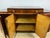 Sideboard with a drawer and four doors in burl wood with aluminum details and Bakelite handles, made in Italy in the...