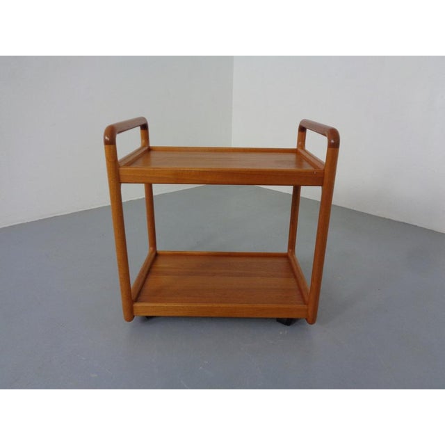 Rollable serving car in Cado teak from the 1970s. This piece has an attribution mark, I am sure that it is completely...