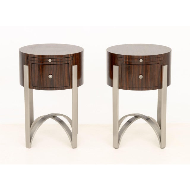 Pair of Michael Berman Zebra Wood Bedside Tables, with one pull shelf and drawer on four chrome supports, with "Michael...