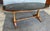 Exceptional Art Deco period dining or center table. Walnut with bronze-tipped feet and decorative appliqués with original...