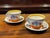 Clarice Cliff Design Crocus Pattern Tea Cups & Saucers. Box with Certification 2 cups 2 saucers Sizes :- cups 7 cms talk,...