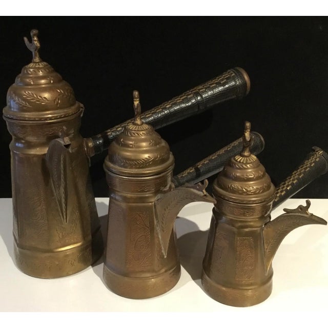 Set of 3 Dallah Coffee Tea Pots Islamic Antique Arabic Brass. They have a beautiful engraved design, with a bird on top of...